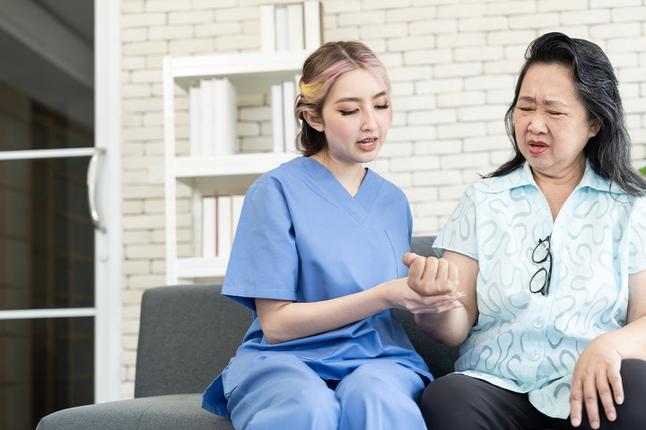 Photo of health worker tending to a patient