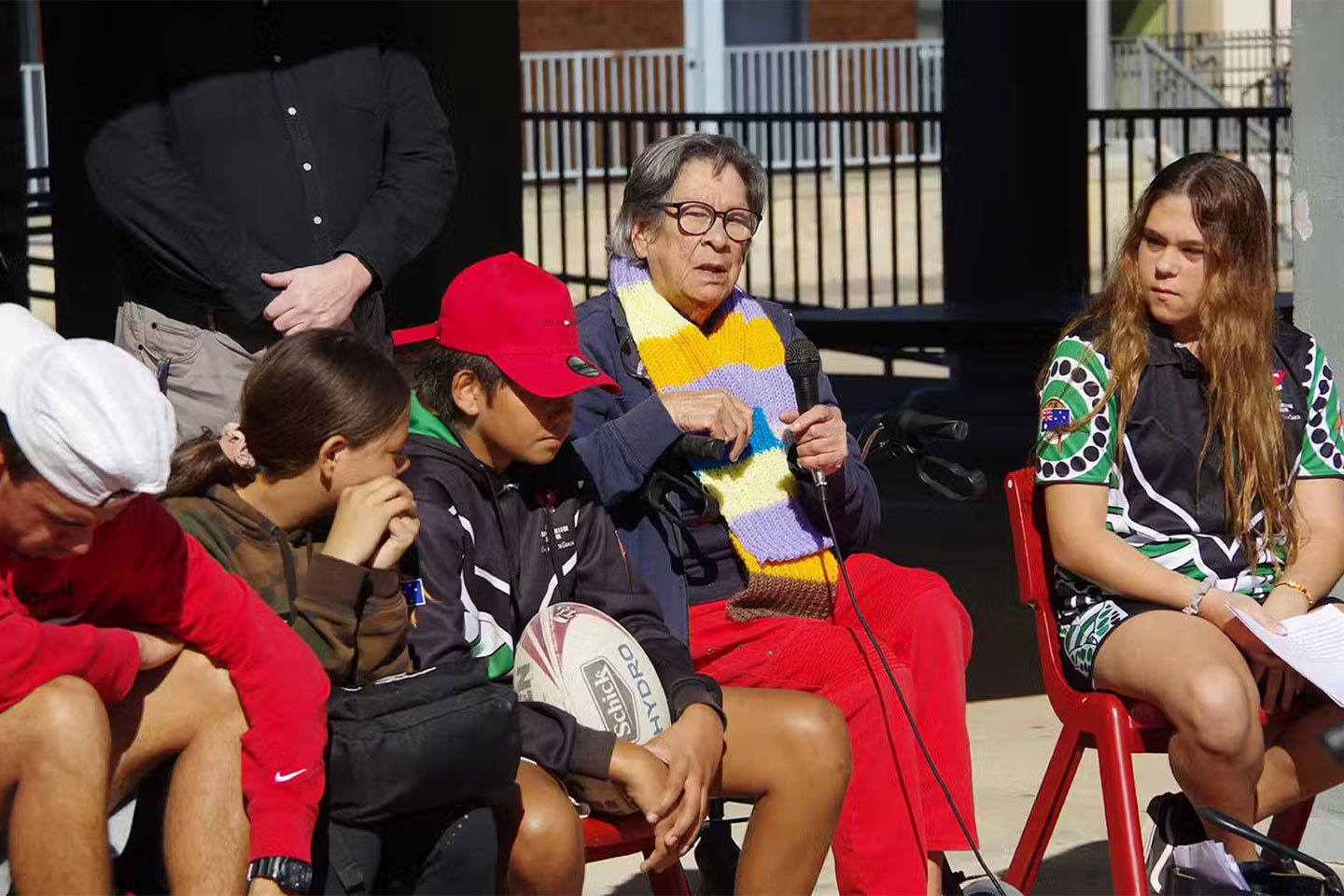 Photo of an elder speaking in a group