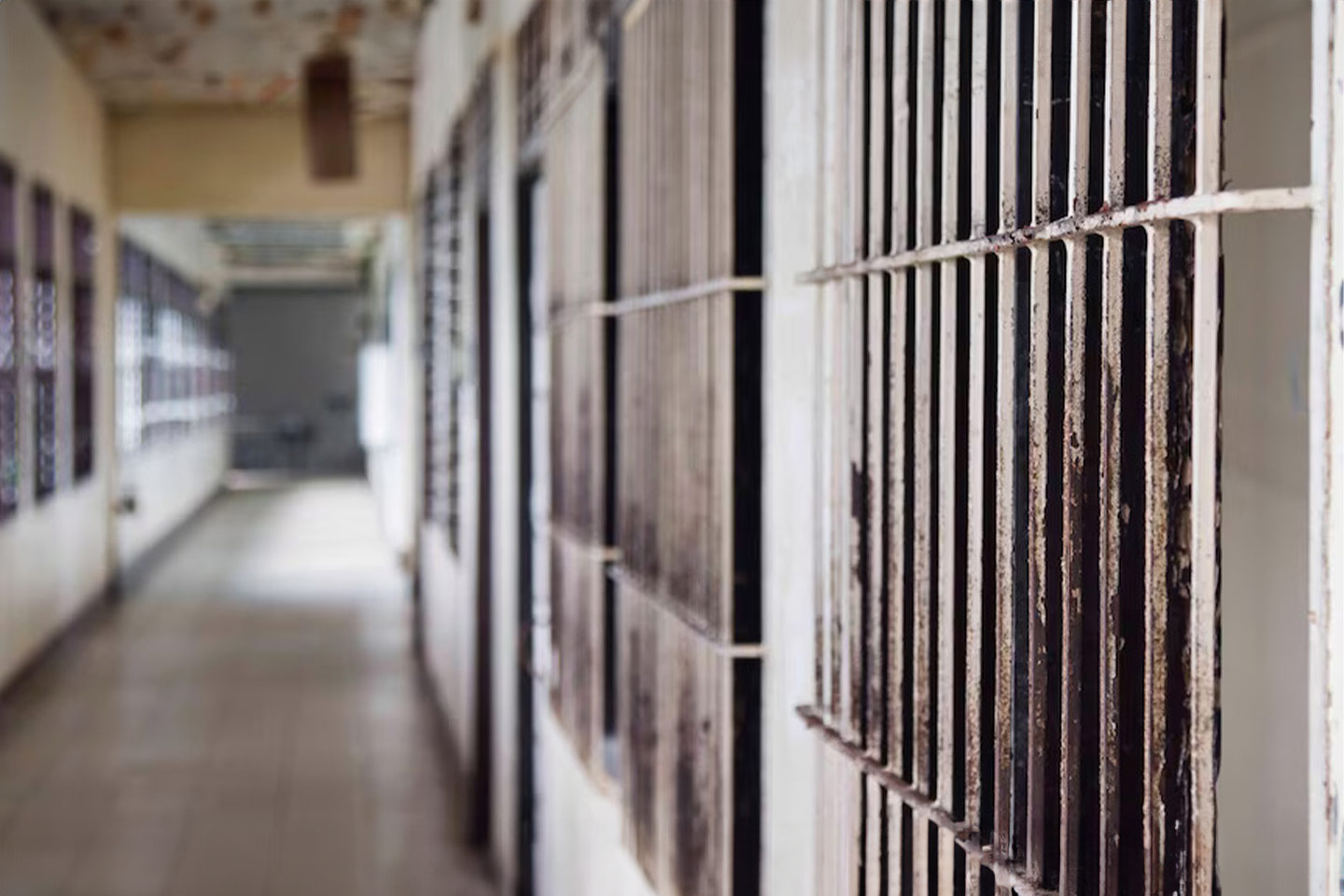 Photo of prison hallway with cells