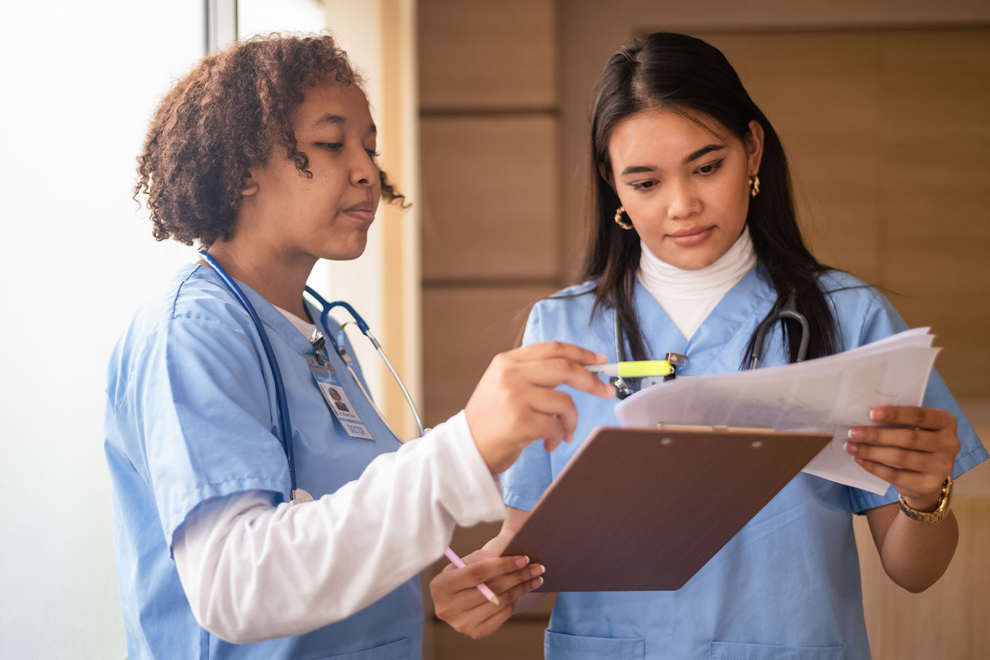 Photo of two nurses in training