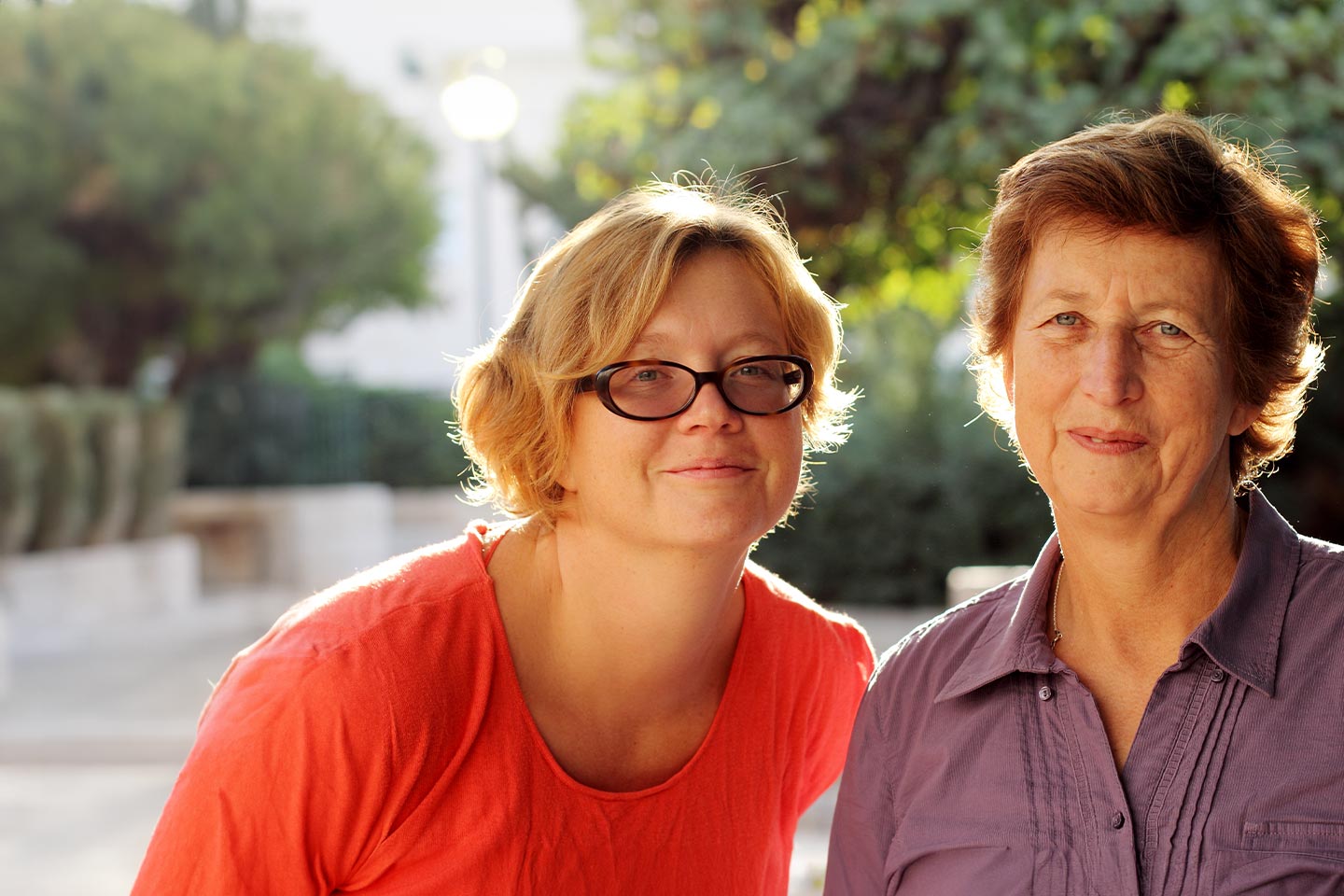 Image of an older mother and adult daughter