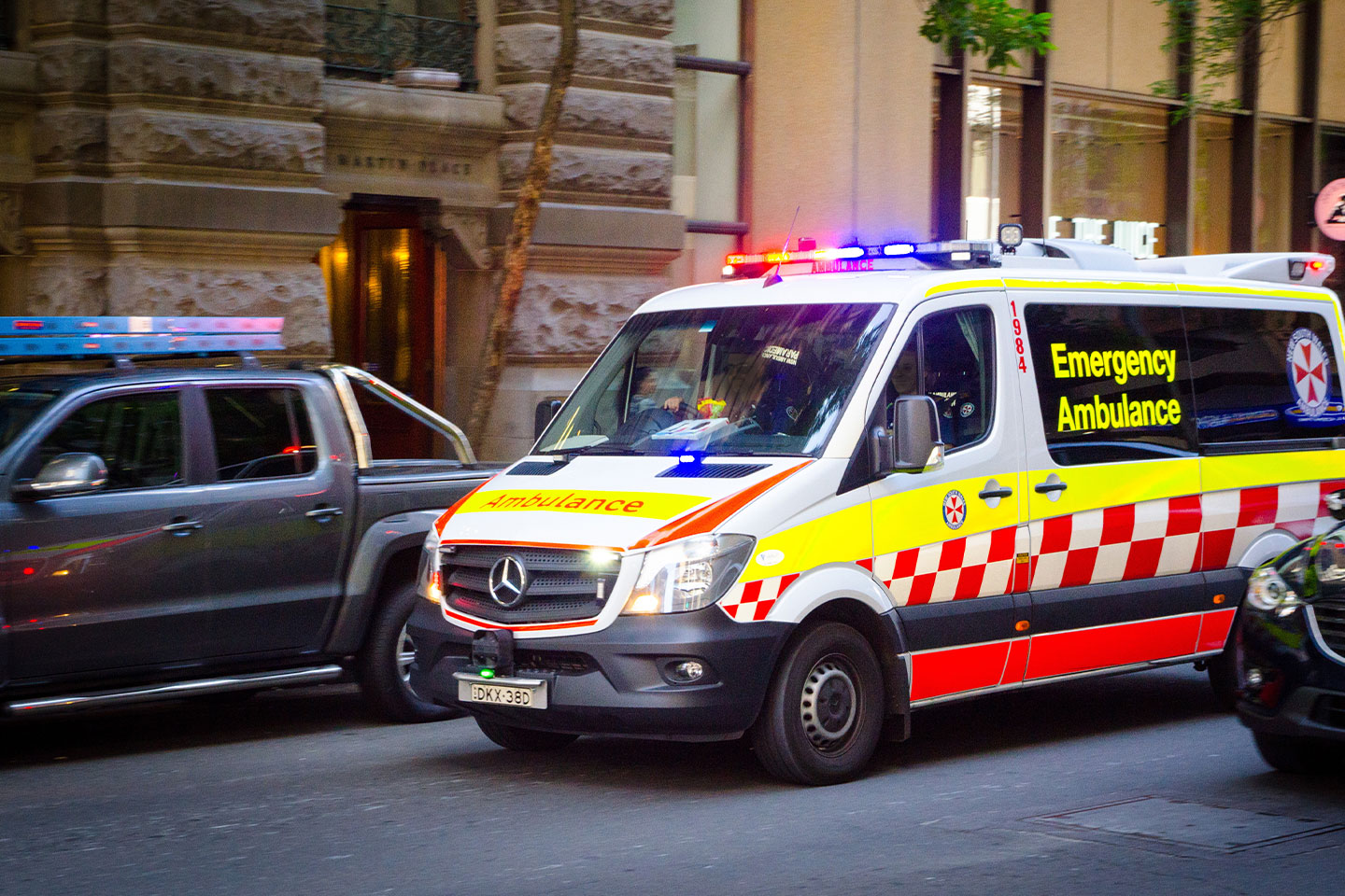 Photo of an ambulance in a city street