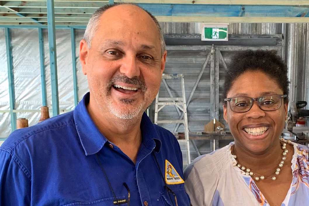 Photo of a man and woman smiling broadly at us