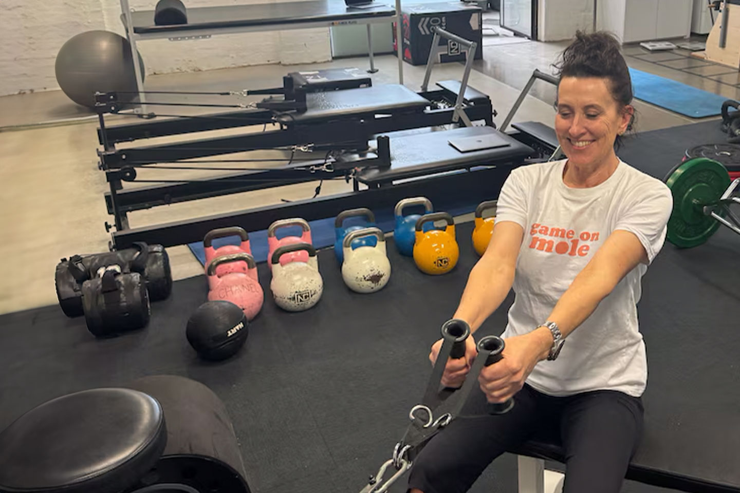 Photo of woman training in a gym