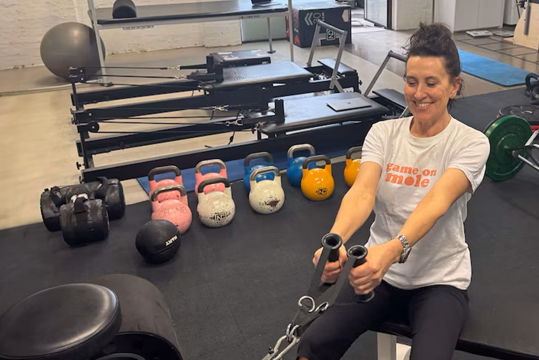 Photo of woman training in a gym
