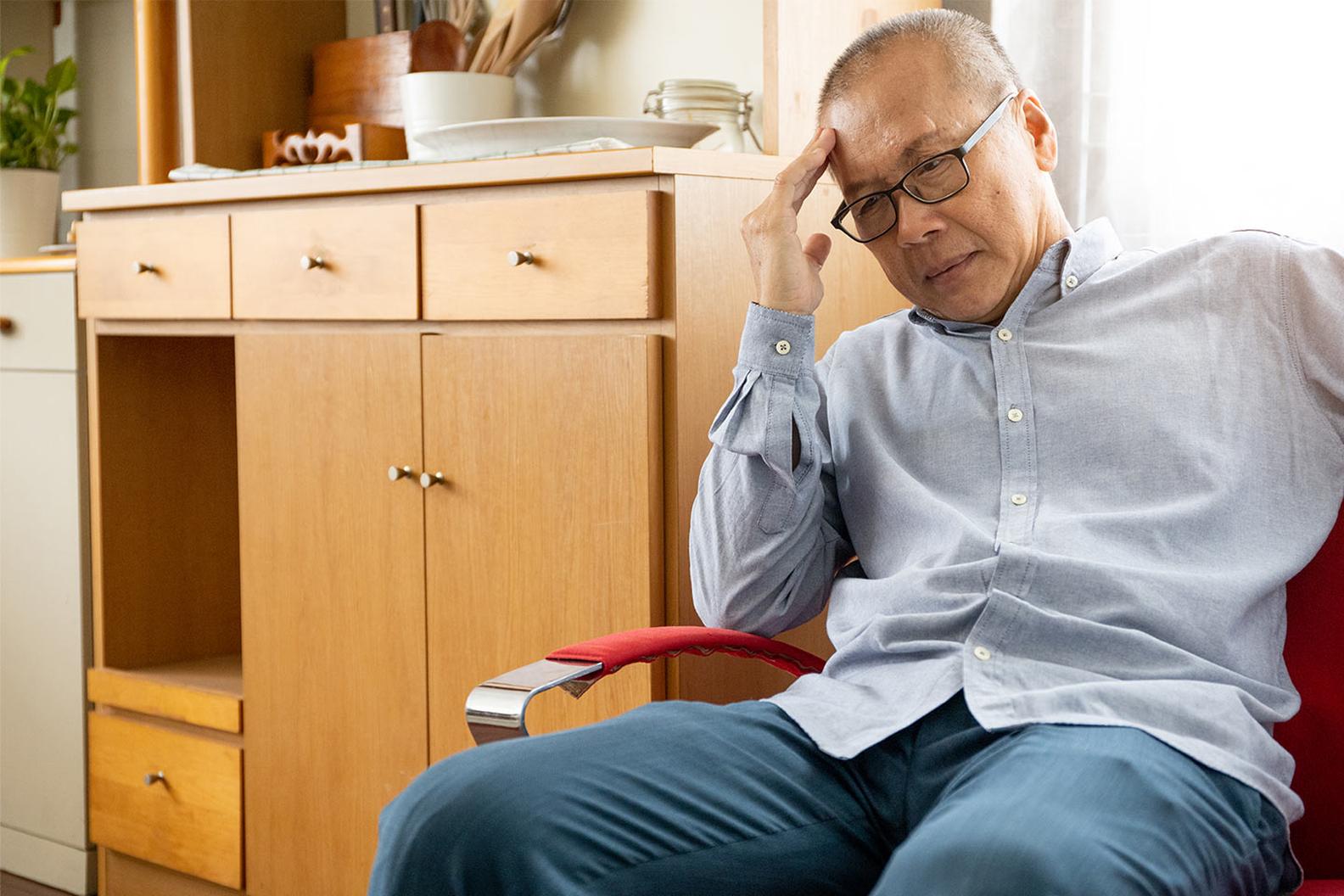 Image of an older Asian man