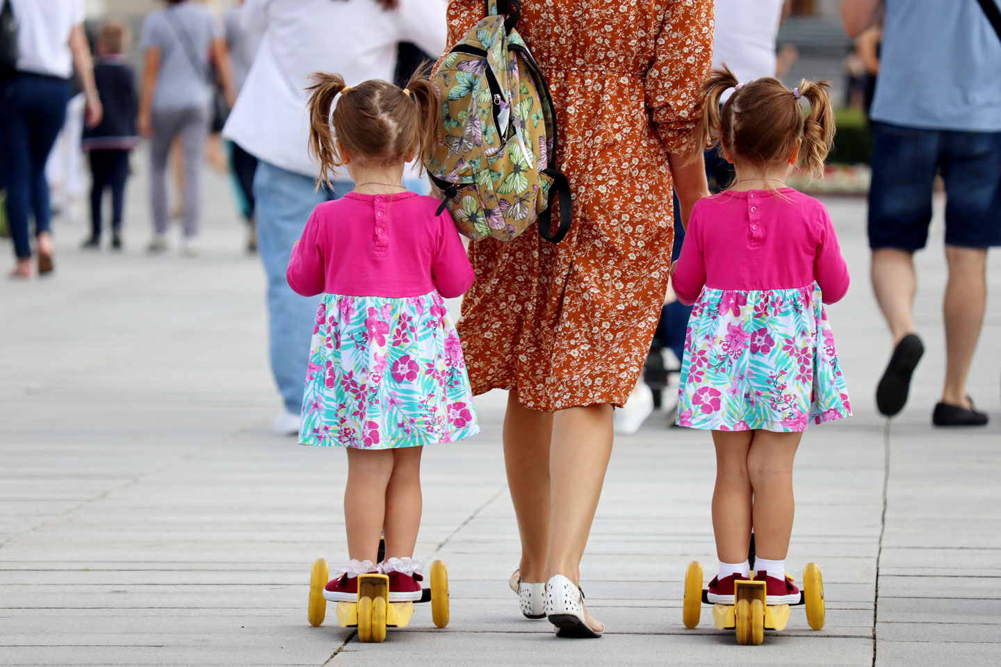 Twins girls with their grandmother 