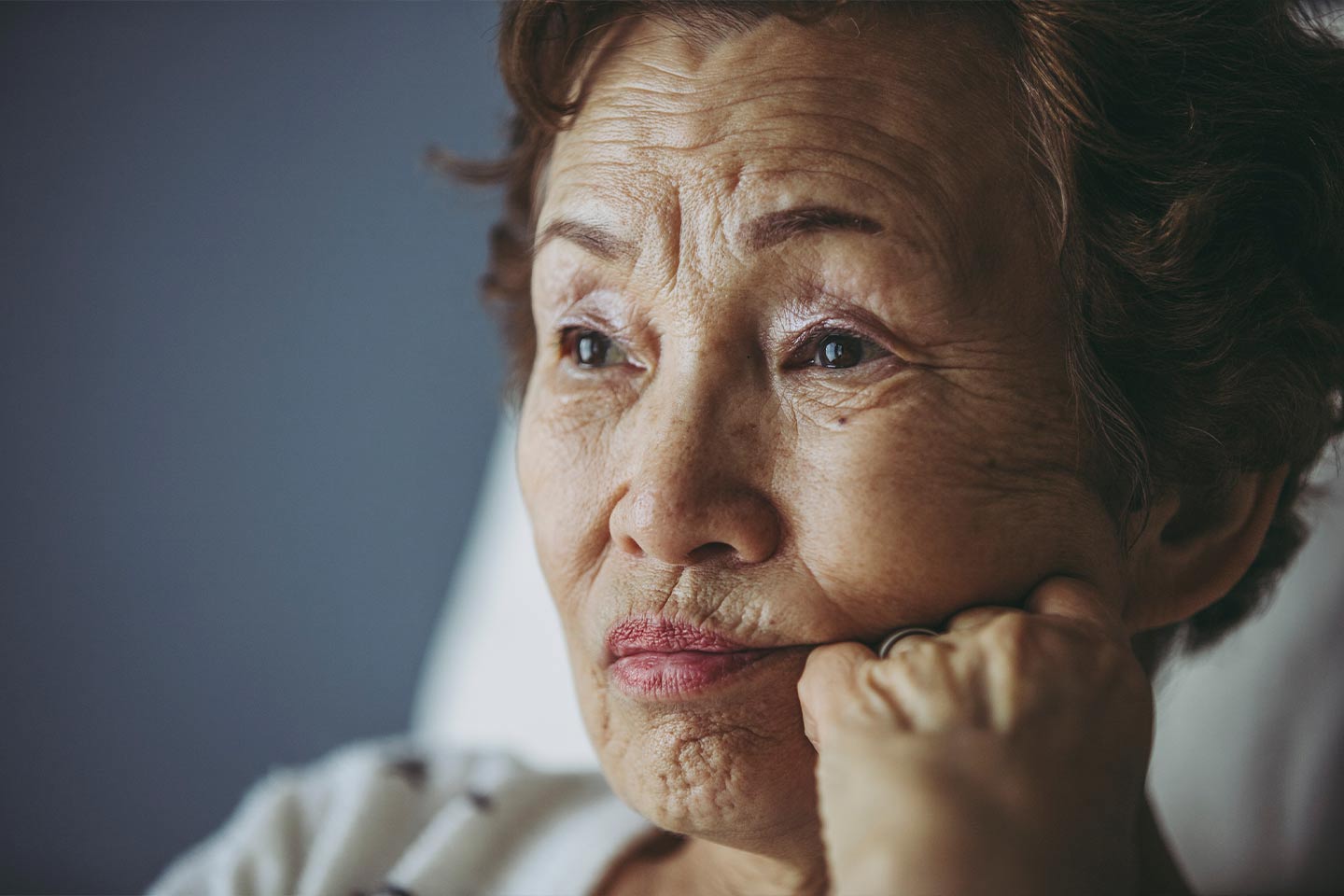 Photo of woman looking pensive