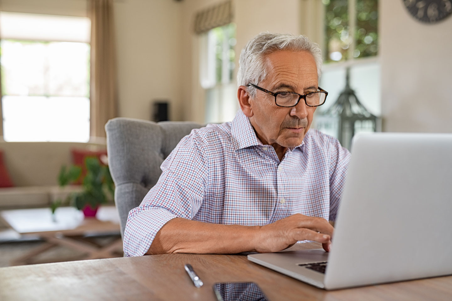 Senior man on computer