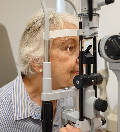 Photo of a woman having her eyes tested at the optometrist