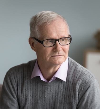 Photo of pensive older man