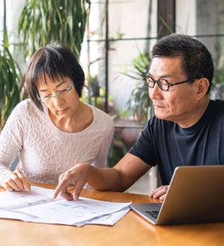 Photo of couple doing paperwork