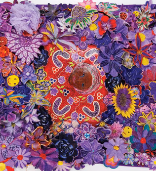 Photo of beautiful purple woven flowers forming a rug