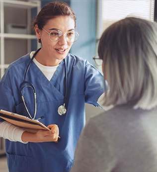 Photo of a health worker with a stethoscope and clipboard