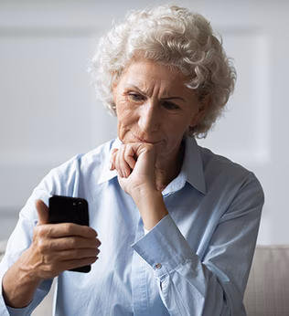 Photo of a woman looking at her phone