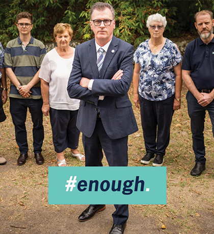 Photo of a group of people with serious expressions