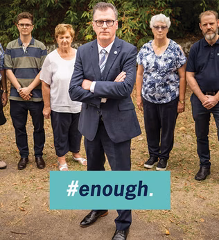 Photo of a group of people with serious expressions
