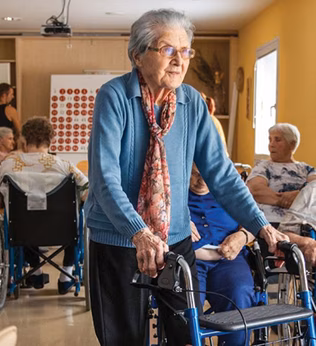 Photo of a group with wheelchairs and walkers