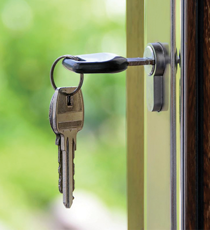 Photo of keys in a front door lock
