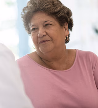 Photo of two women chatting with each other