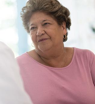 Photo of two women chatting with each other