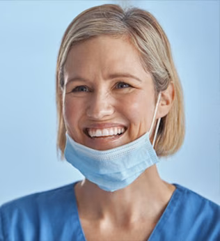 Photo of a healthcare worker smiling with a mask