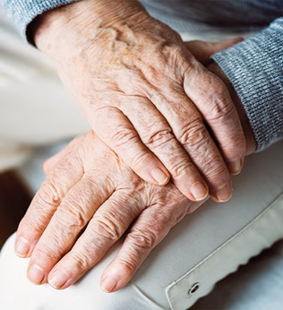 Photo of aged hands in closeup