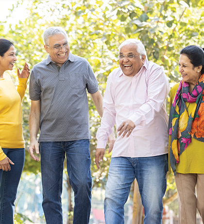 Photo of a group of four people walking in nature
