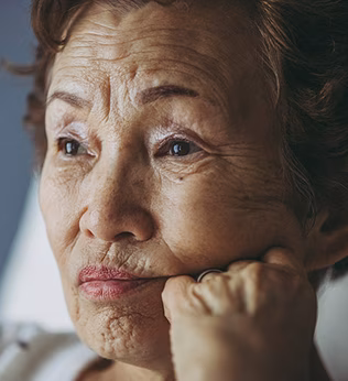 Photo of woman looking pensive
