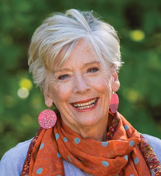 Photo of Maggie Beer wearing a red spotty scarf