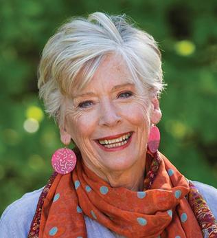 Photo of Maggie Beer wearing a red spotty scarf