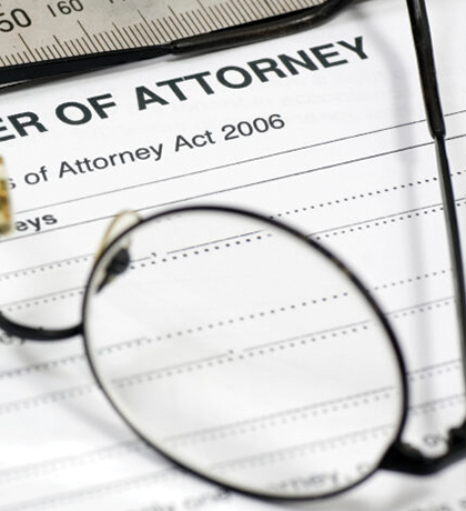 Photo of glasses sitting on documents