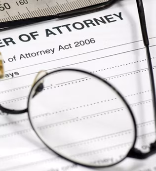 Photo of glasses sitting on documents