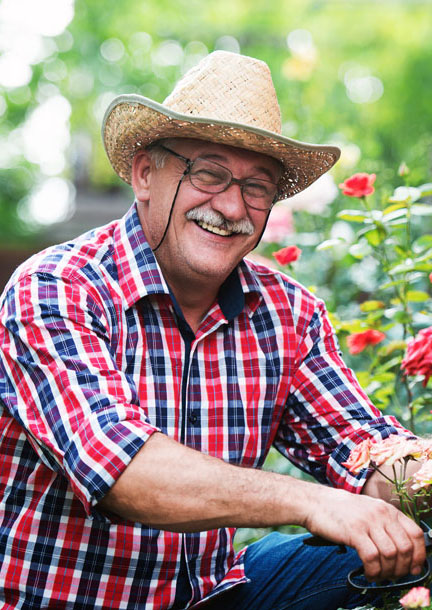 Senior man gardening happily