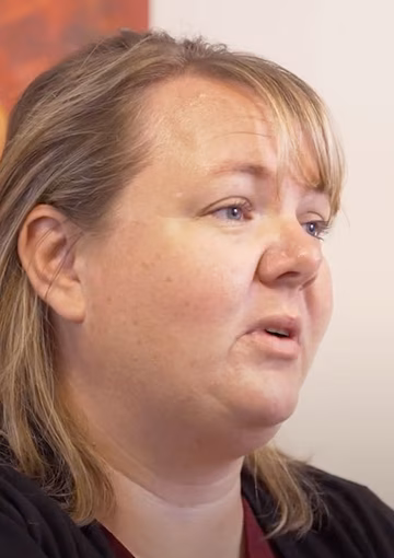 Close up of woman being interviewed