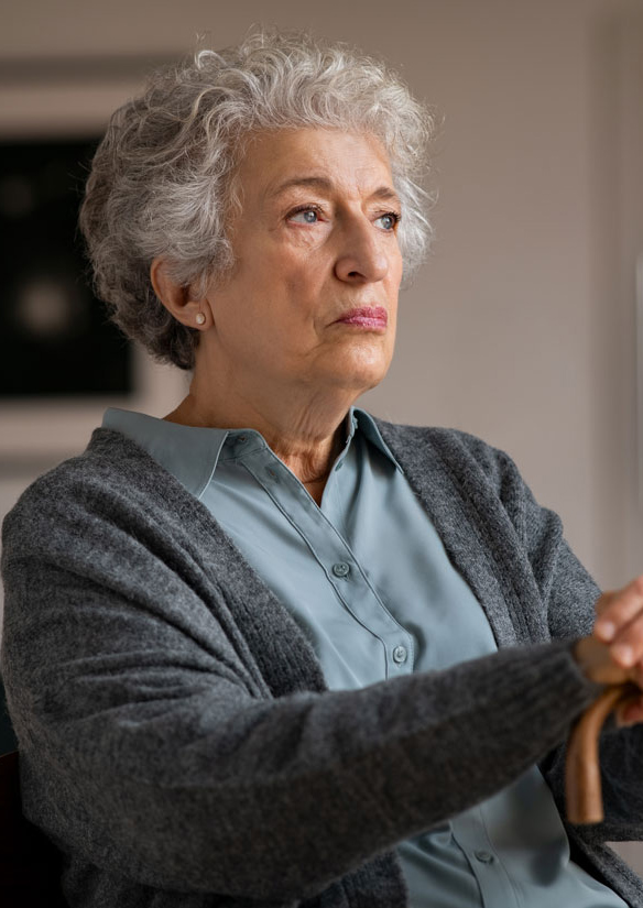 Sad-looking elderly woman