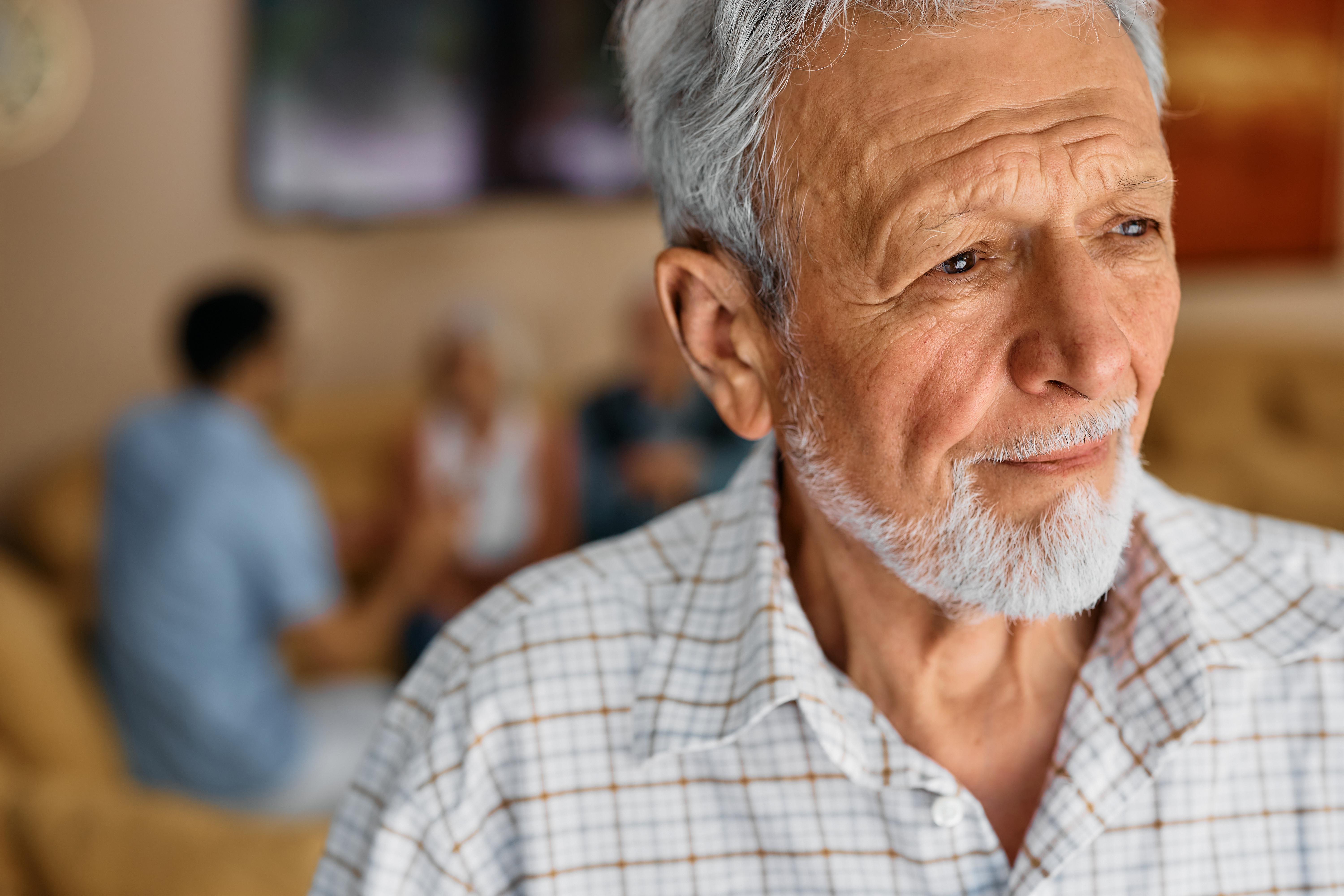 Image on an older man looking contemplative