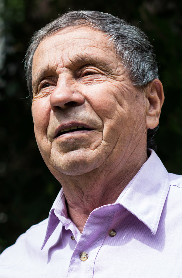 Older man looking away from camera