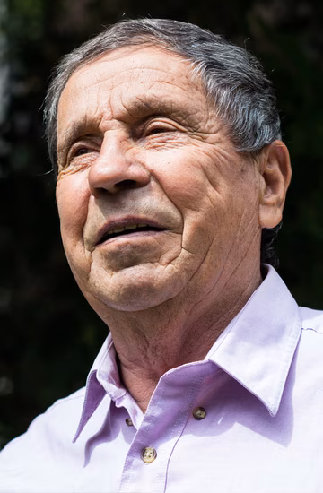 Older man looking away from camera