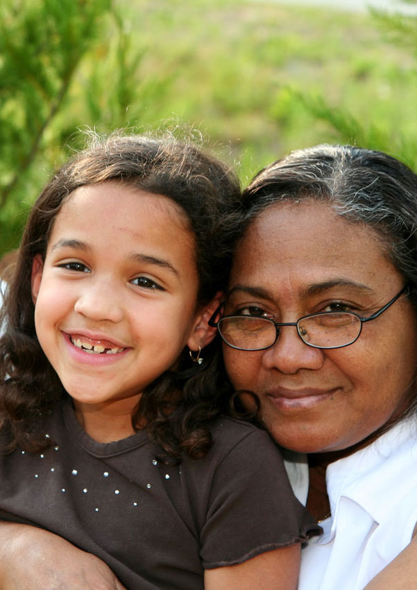 Elderly couple with granddaughter