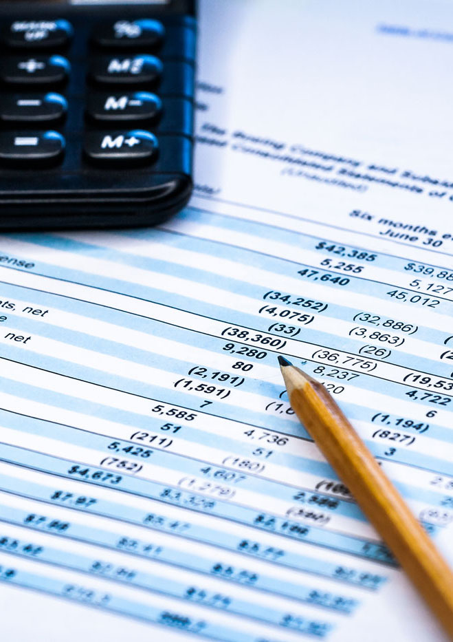 Pencil on financial papers