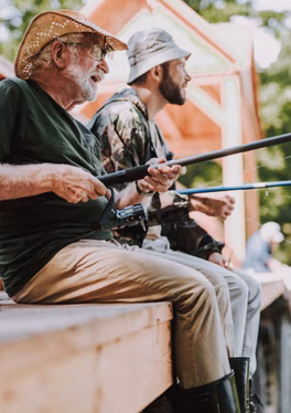 Father and son fishing together