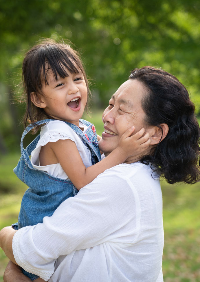 Grandmother and Granddaughter laughing