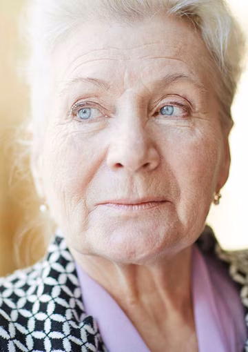 Senior woman looking away from camera