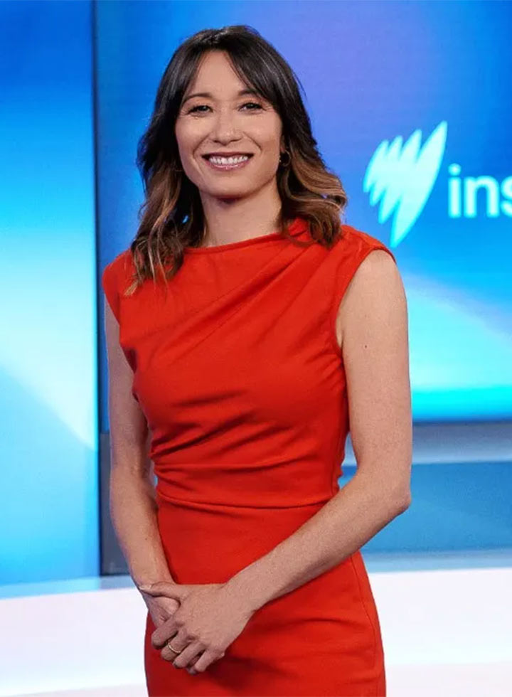 Photo of TV presenter in a red dress