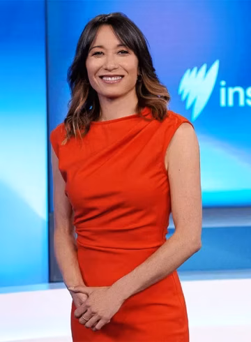 Photo of TV presenter in a red dress