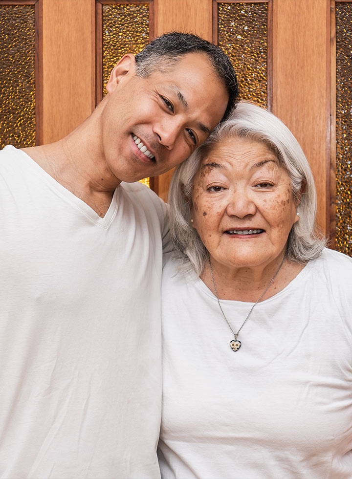 Photo of two people wearing white