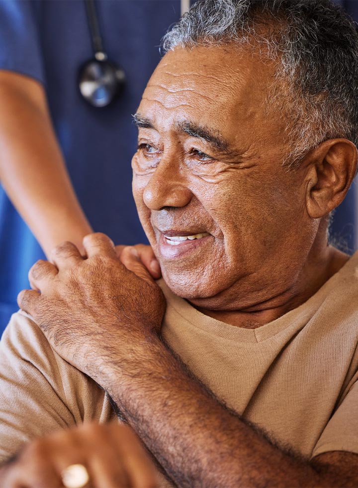 Graphic of man clasping nurse's hand