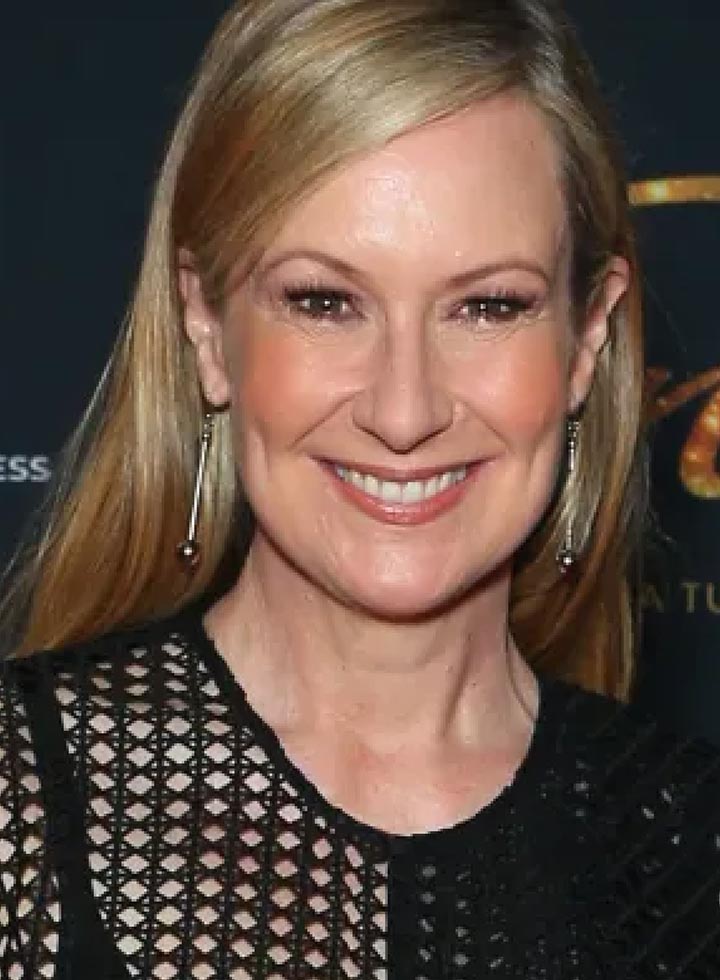 Photo of blonde woman smiling broadly