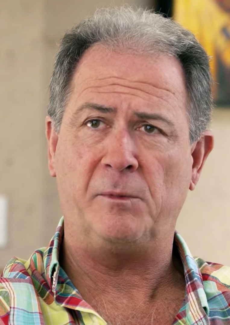 Senior man being interviewed